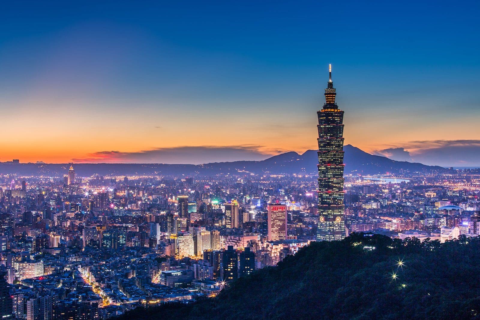 Taipei 101 skyscraper rising above the Taipei skyline, one of the most studied examples of wind-resistant building design