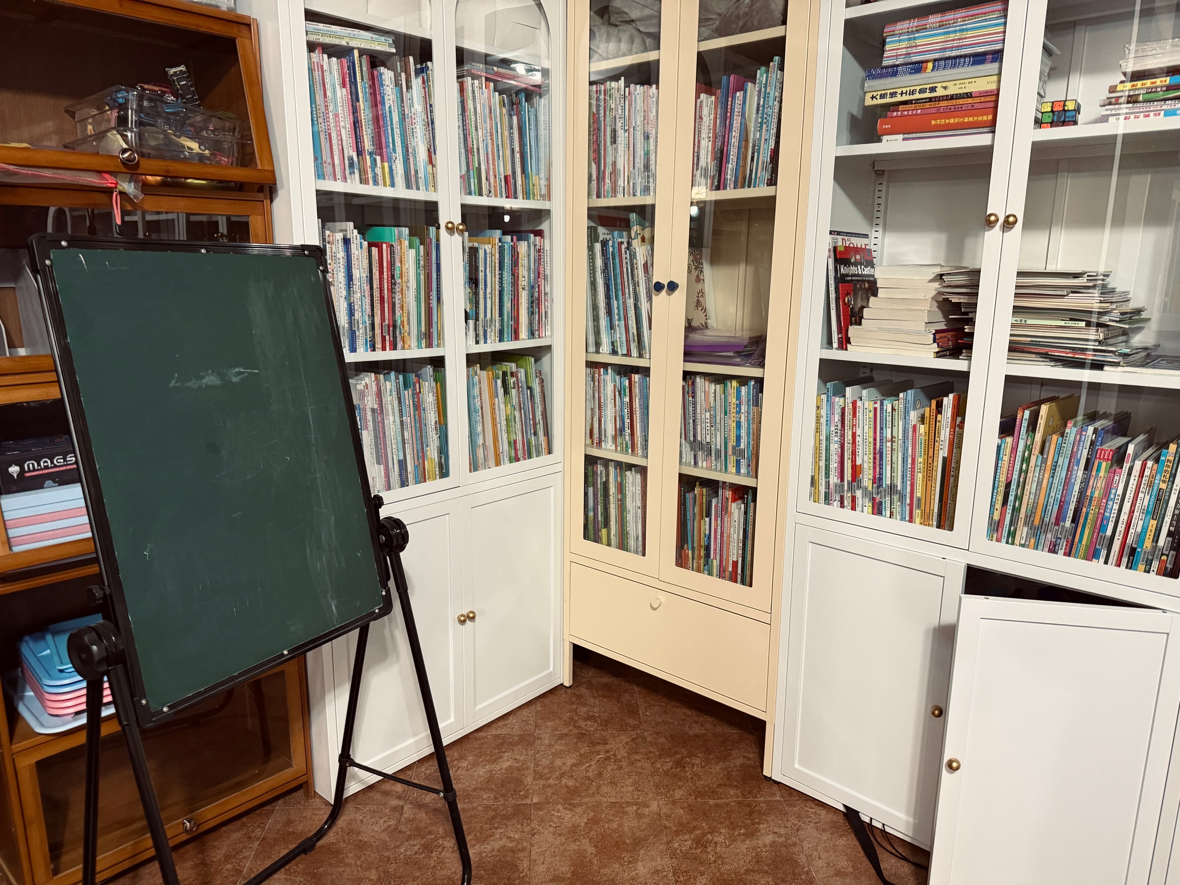 The reading room at Lanyu Books in Shanghai, with bookshelves and a chalkboard set up for the program